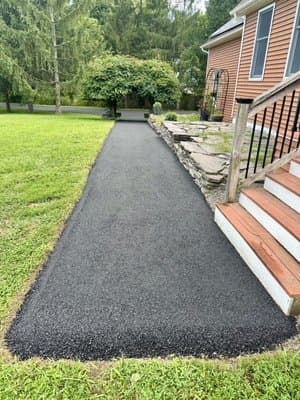 Fresh paved walkway and driveway